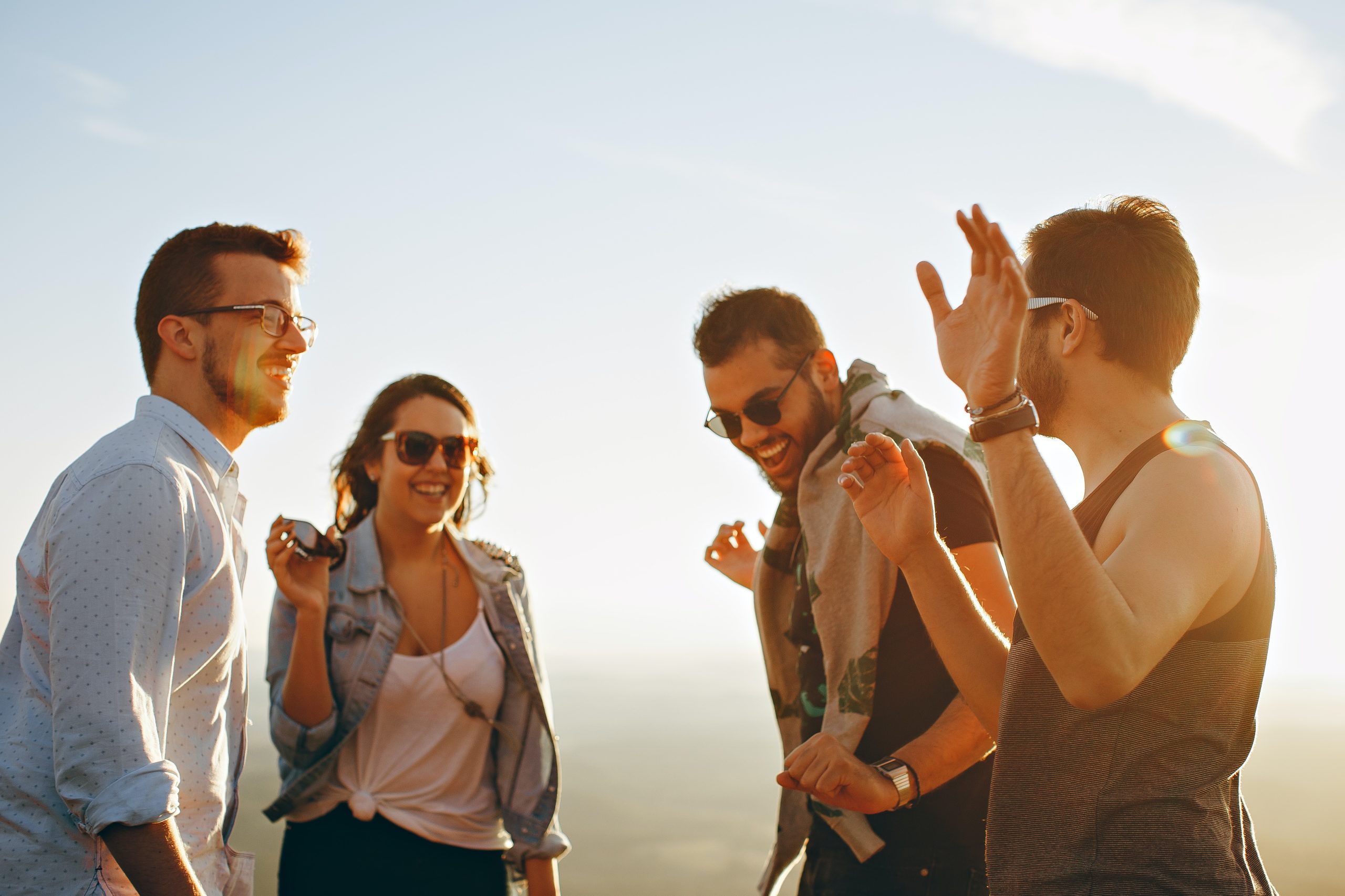 Group of people having fun together under the sun 708392 scaled